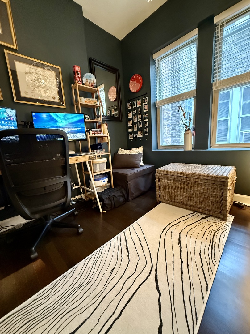 4720 North Beacon Street, Unit 2N Chicago, IL 60640 - Photo 23 of 26 a bedroom with two beds and a window