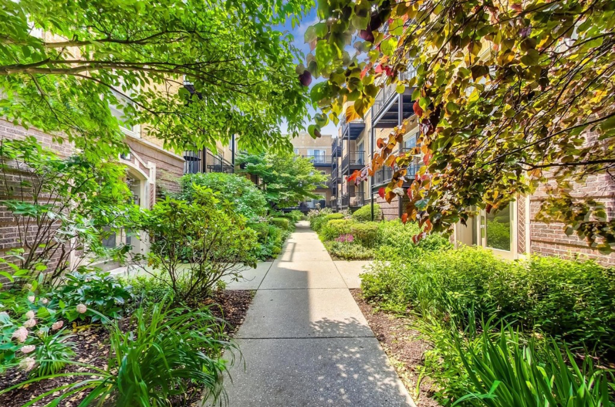 4720 North Beacon Street, Unit 2N Chicago, IL 60640 - Photo 3 of 26 a view of a pathway with a building in the background
