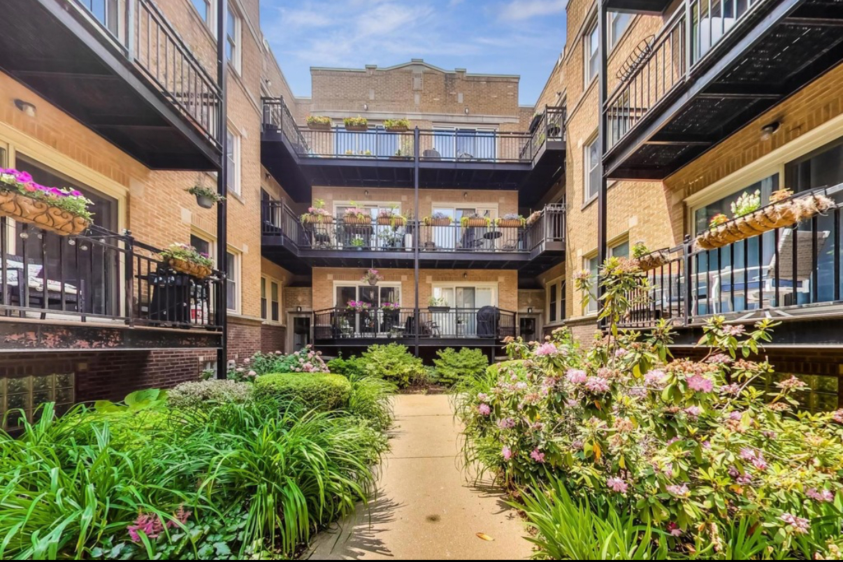 4720 North Beacon Street, Unit 2N Chicago, IL 60640 - Photo 4 of 26 a view of a building with a pathway