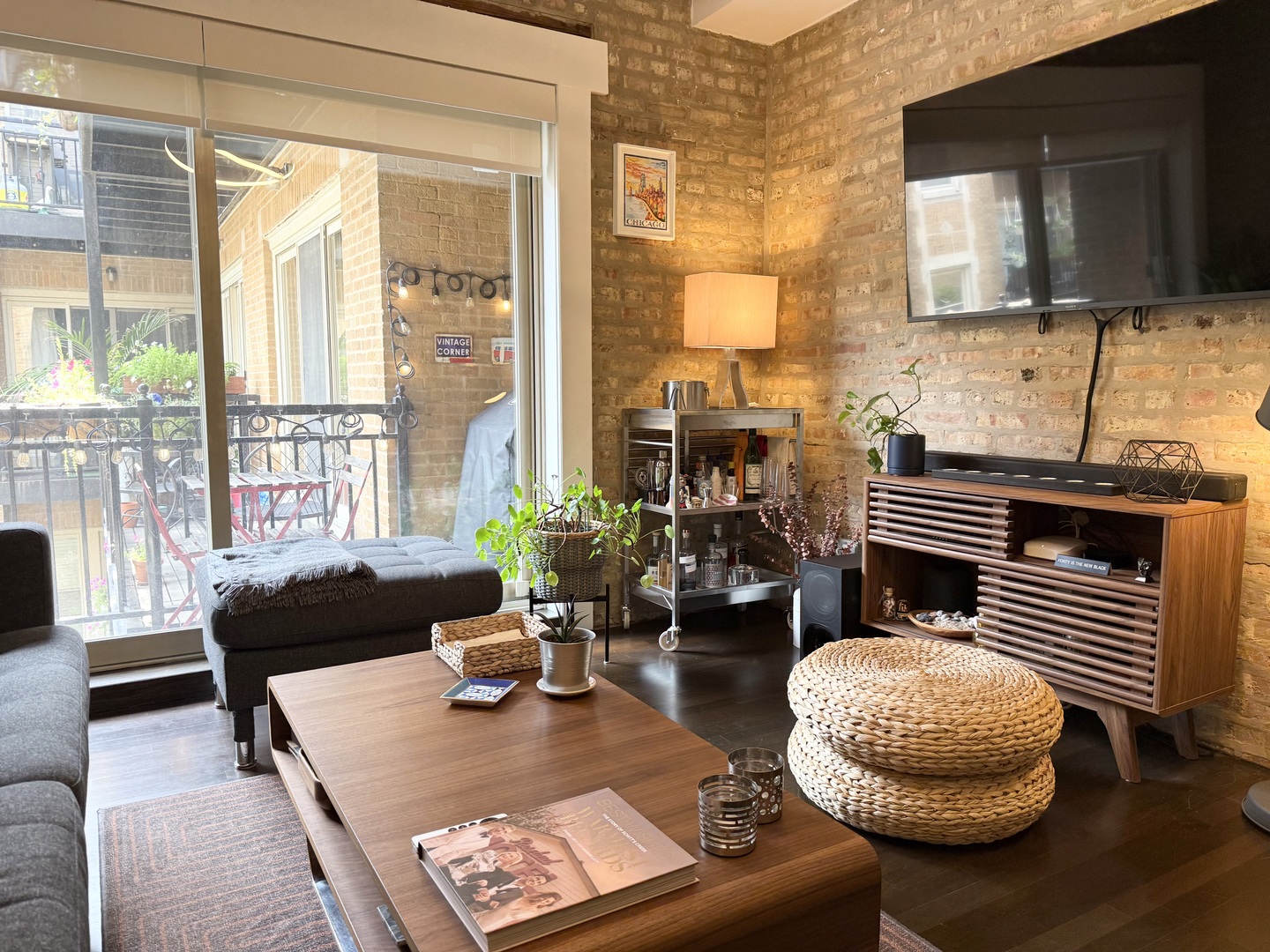 4720 North Beacon Street, Unit 2N Chicago, IL 60640 - Photo 10 of 26 a living room with furniture and wooden floor