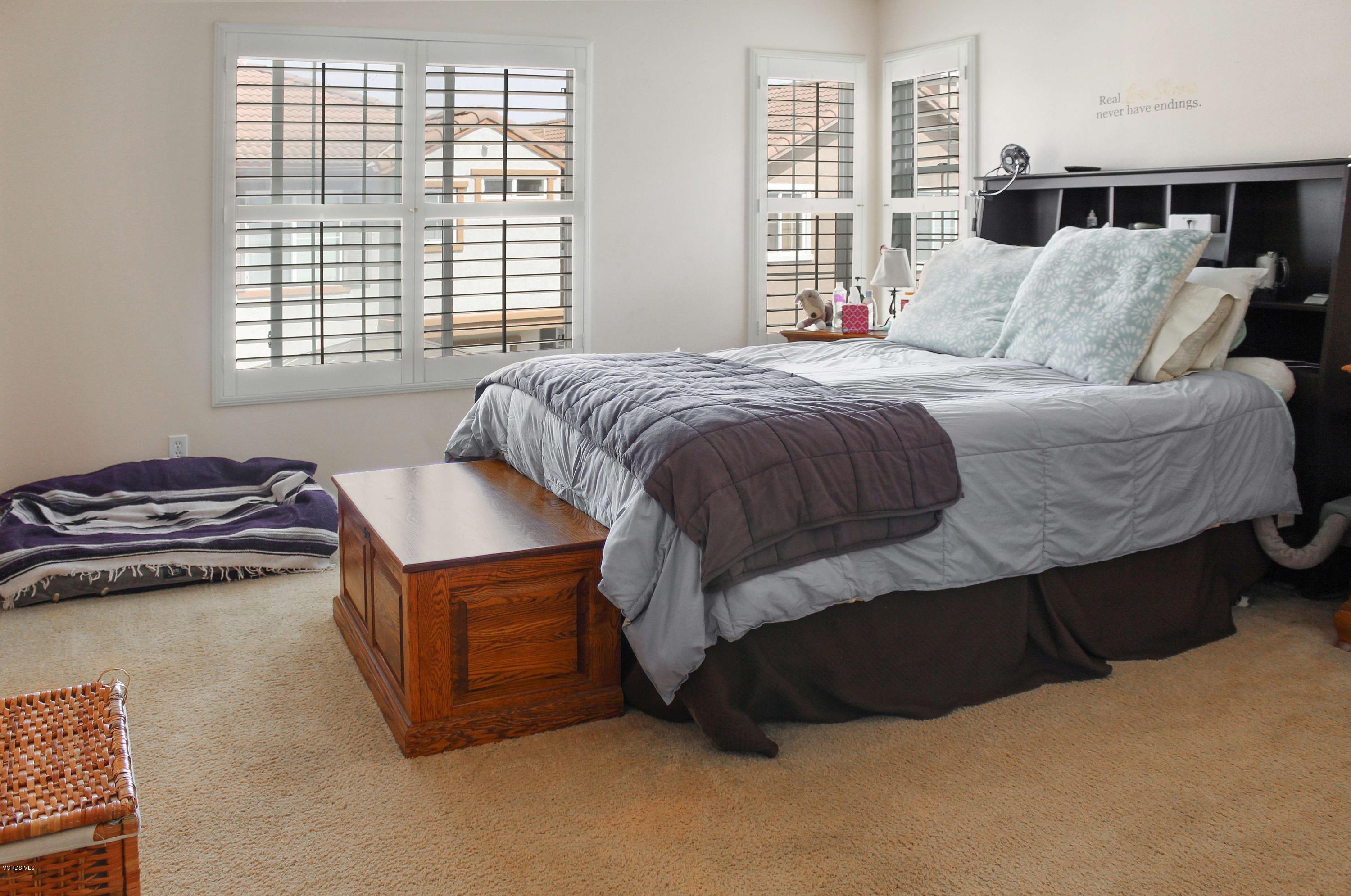 407 Field Street Oxnard, CA 93033 - Photo 11 of 15 a bedroom with a bed and a window