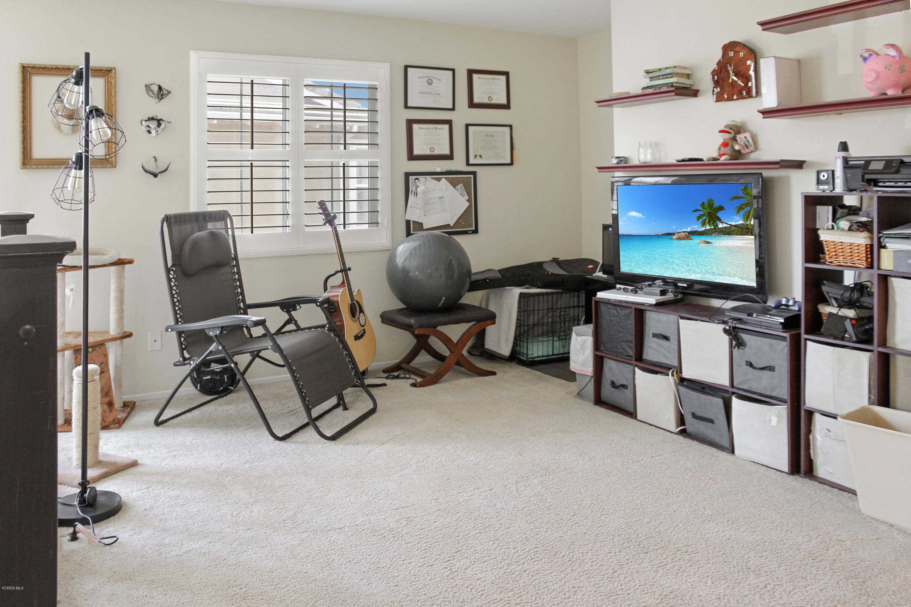407 Field Street Oxnard, CA 93033 - Photo 7 of 15 a view of a workspace with furniture and a window