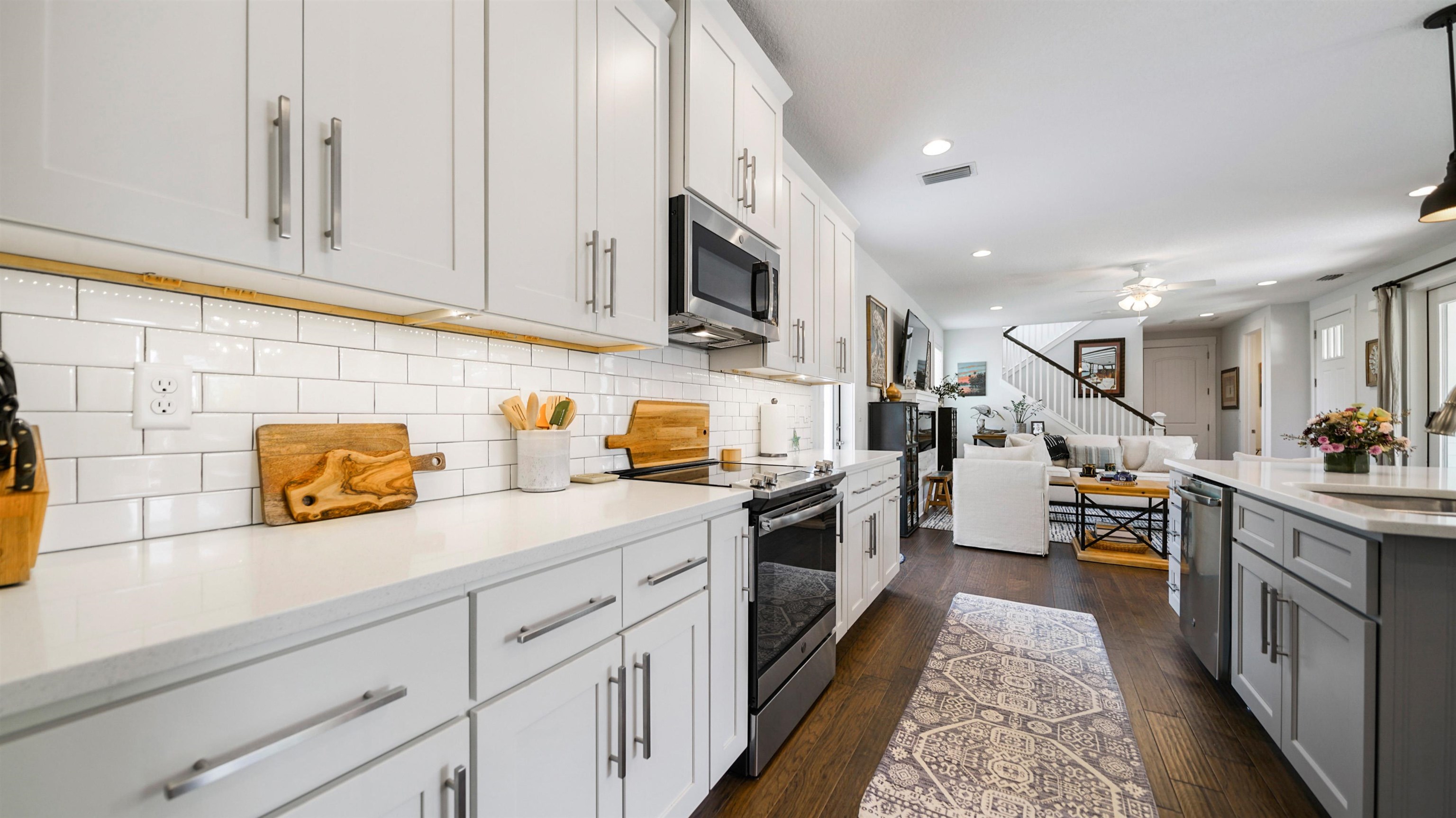 304 Ribault Street St. Augustine, FL 32080 - Photo 18 of 69 a kitchen with stainless steel appliances granite countertop lots of counter top space