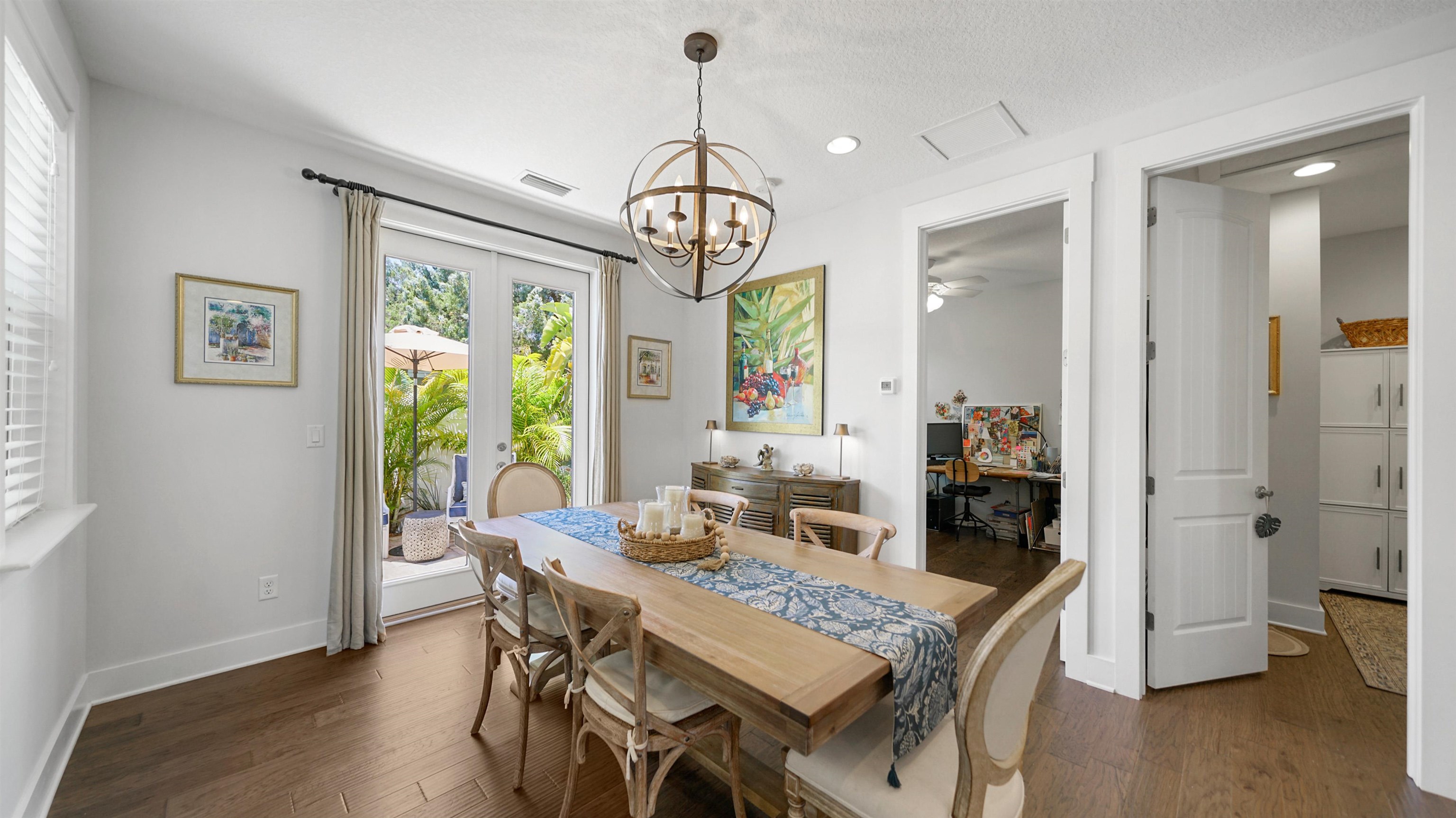 304 Ribault Street St. Augustine, FL 32080 - Photo 22 of 69 a view of a dining room with furniture window and wooden floor