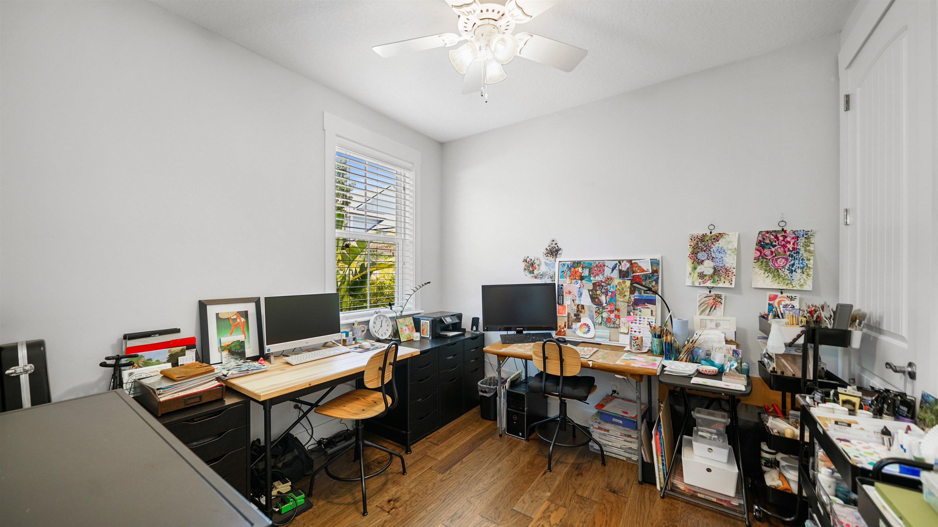 304 Ribault Street St. Augustine, FL 32080 - Photo 23 of 69 a view of a workspace with furniture and a wooden floor