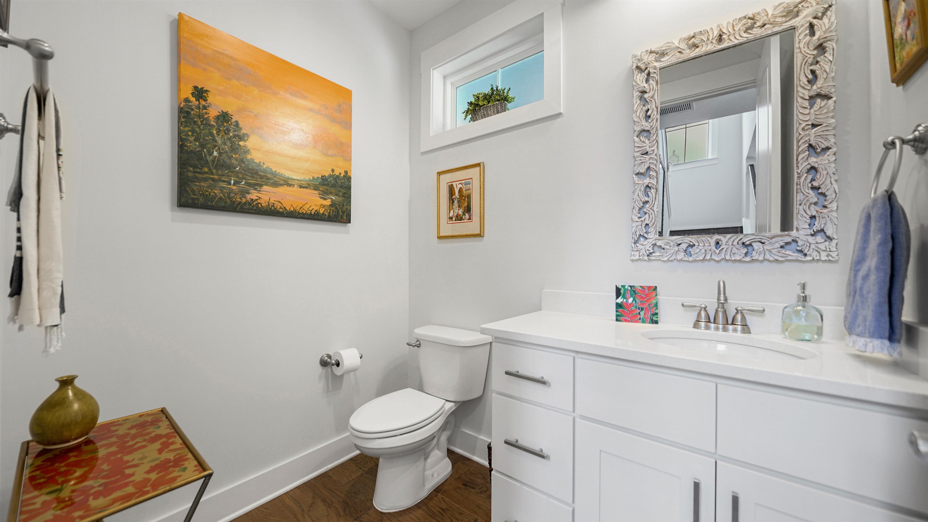 304 Ribault Street St. Augustine, FL 32080 - Photo 26 of 69 a bathroom with a toilet a sink and a mirror