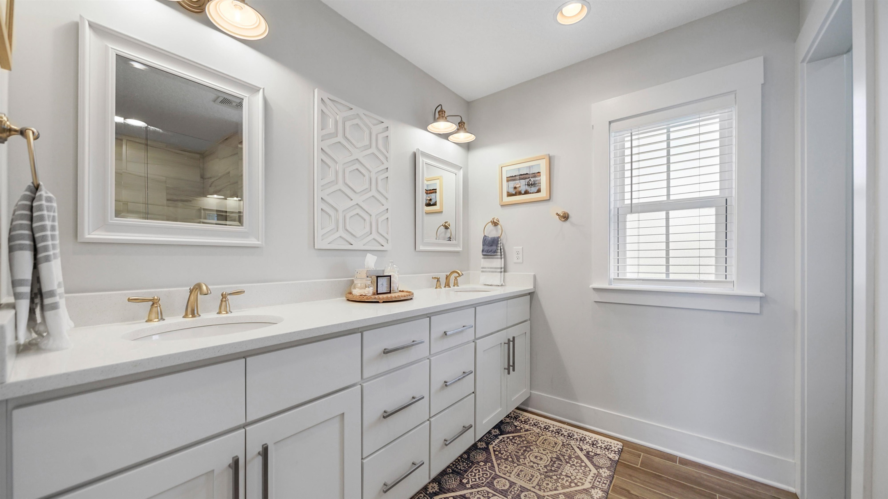 304 Ribault Street St. Augustine, FL 32080 - Photo 32 of 69 a bathroom with a sink and a mirror