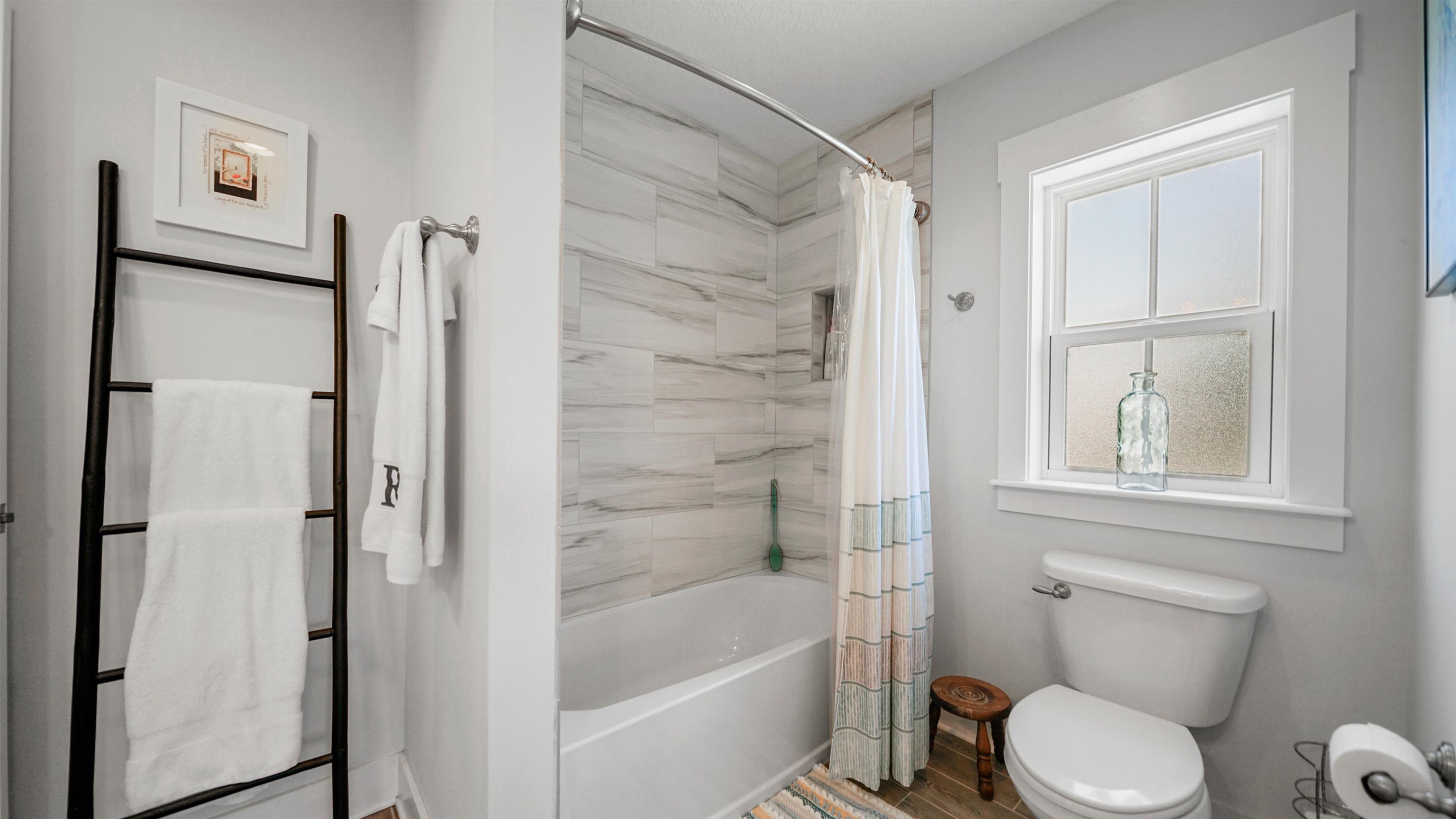 304 Ribault Street St. Augustine, FL 32080 - Photo 38 of 69 a bathroom with a toilet and shower