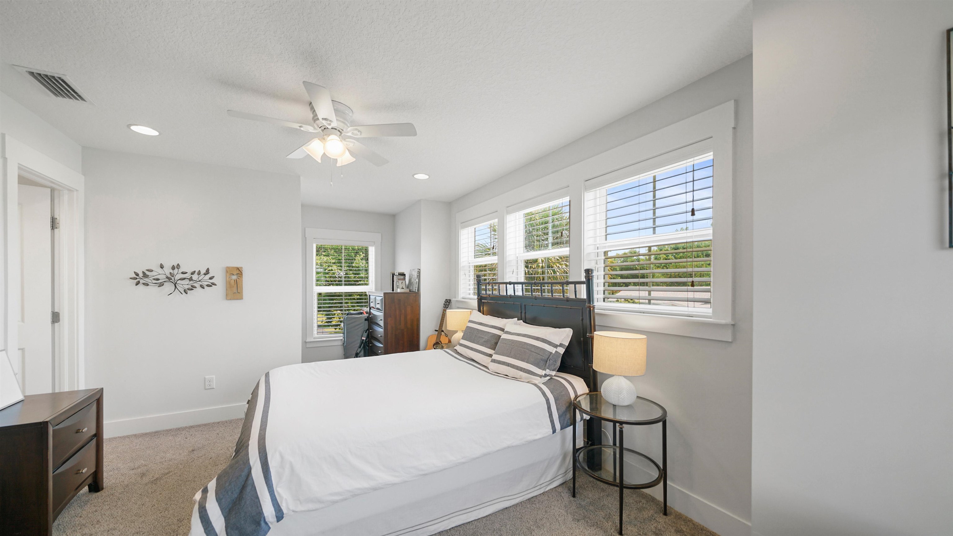 304 Ribault Street St. Augustine, FL 32080 - Photo 42 of 69 a bedroom with a bed and a window