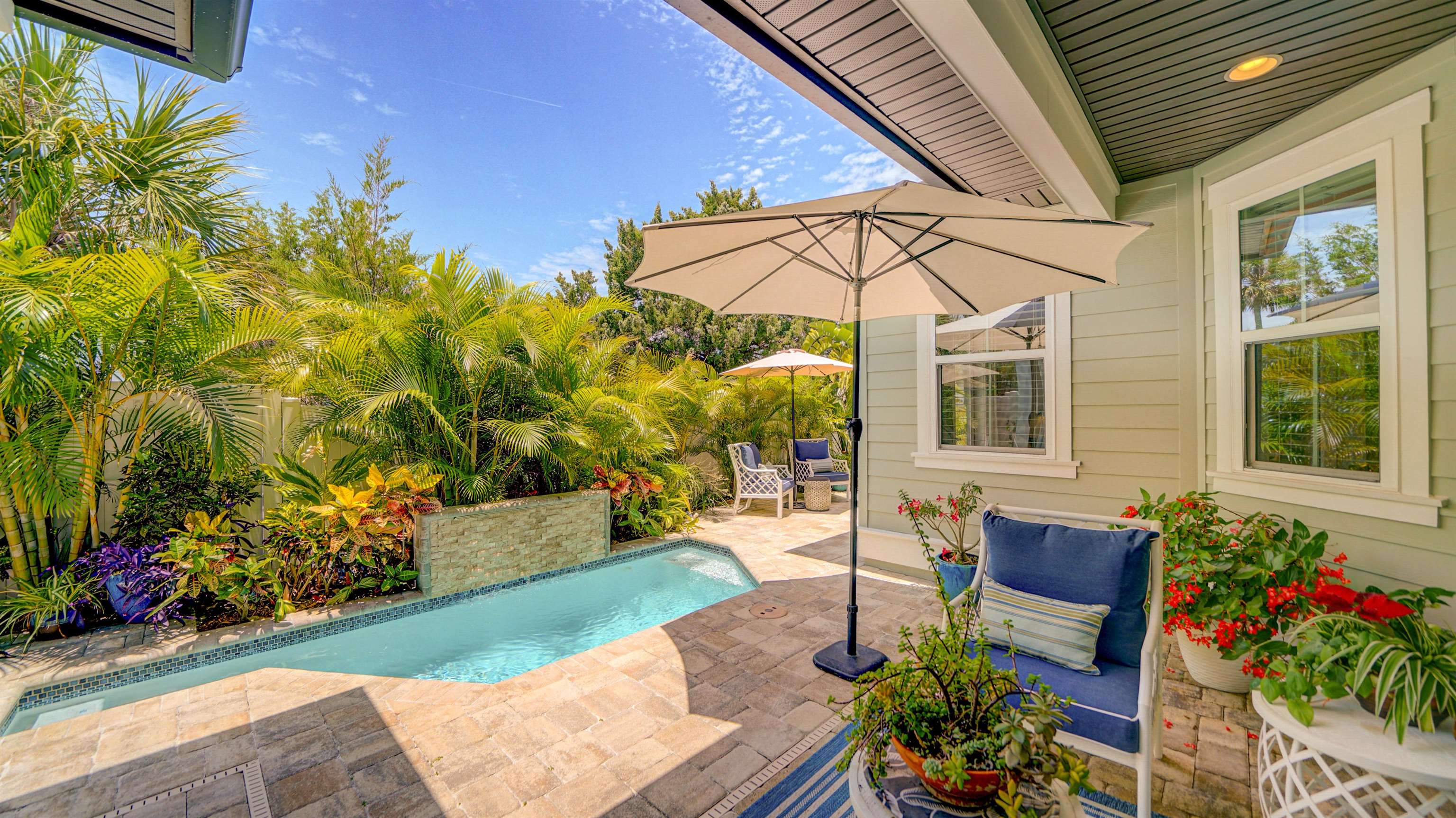 304 Ribault Street St. Augustine, FL 32080 - Photo 44 of 69 a view of a porch with furniture and a yard