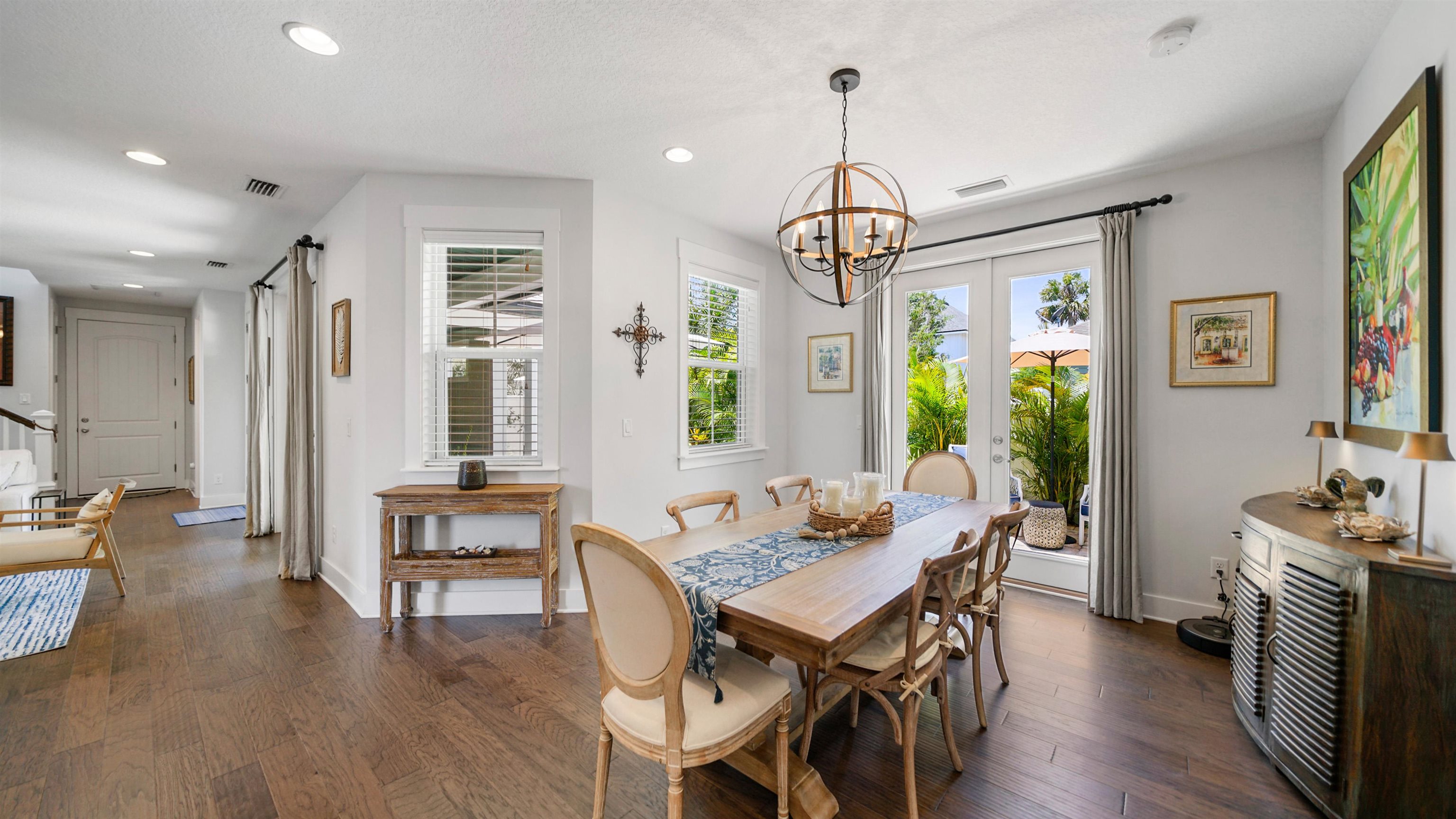 304 Ribault Street St. Augustine, FL 32080 - Photo 8 of 69 a view of a dining room with furniture window and wooden floor