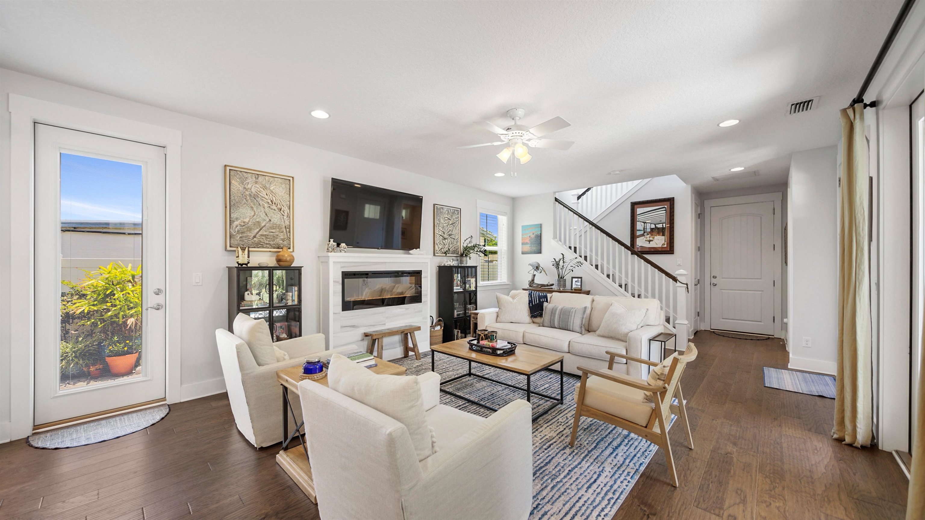 304 Ribault Street St. Augustine, FL 32080 - Photo 10 of 69 a living room with fireplace furniture and a flat screen tv