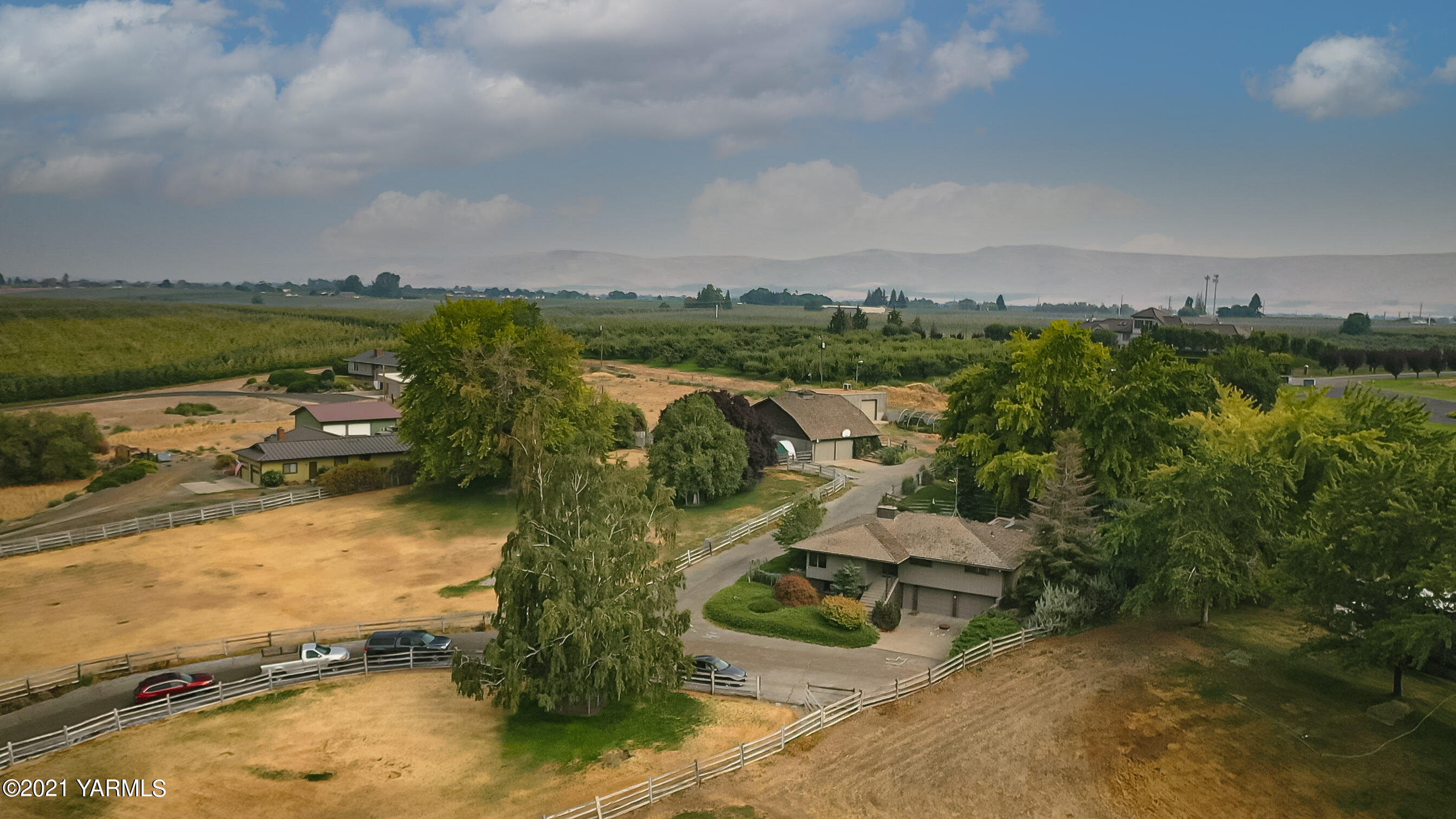 10906 Zier Road Yakima, WA 98908 - Photo 40 of 43 an aerial view of residential building with outdoor space and ocean view