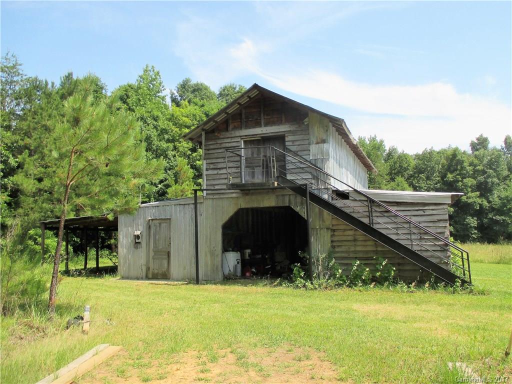 1640 Logan Terry Road, Unit 1 Lancaster, SC 29720 - Photo 6 of 24 a front view of a house with a yard