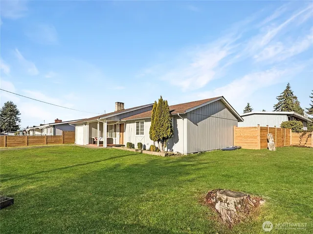 a house view with a garden space
