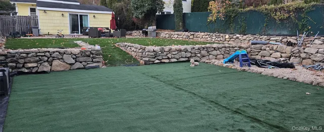 a view of swimming pool from a yard
