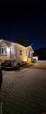 a view of swimming pool with outdoor seating