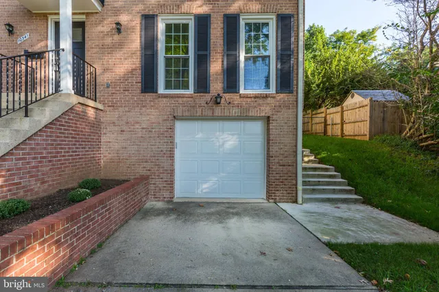 a view of a balcony with a potted plant