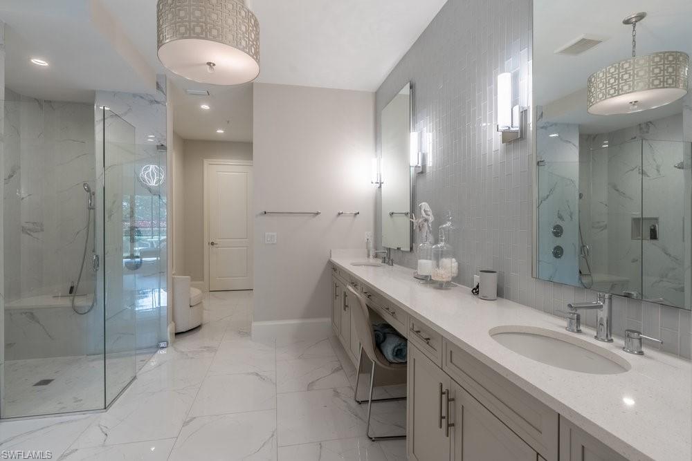 16366 Corsica Way, Unit 102 Naples, FL 34110 - Photo 11 of 28 Primary Bath