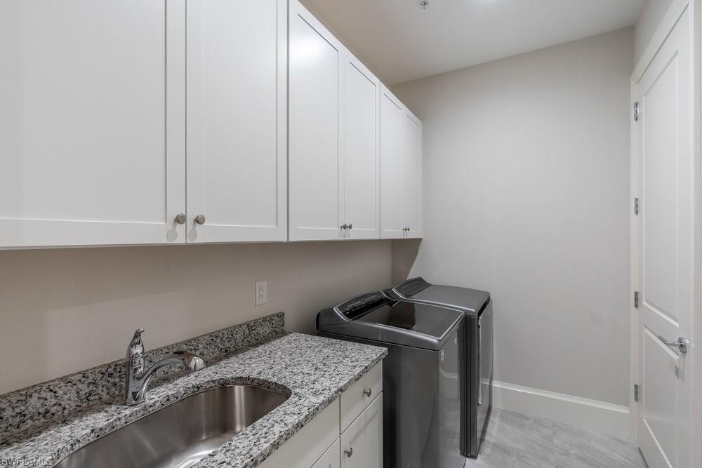 16366 Corsica Way, Unit 102 Naples, FL 34110 - Photo 13 of 28 Laundry