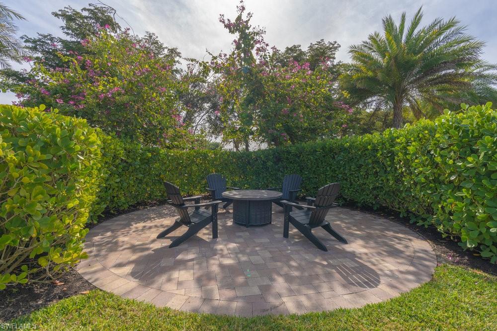 16366 Corsica Way, Unit 102 Naples, FL 34110 - Photo 17 of 28 Outdoor firepit