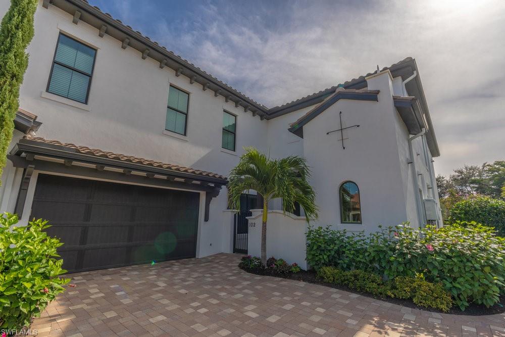 16366 Corsica Way, Unit 102 Naples, FL 34110 - Photo 18 of 28 2 car attached garage