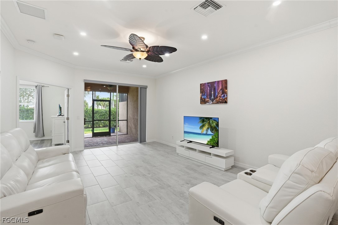 1936 Wellington Street Naples, FL 34120 - Photo 12 of 27 a living room with furniture