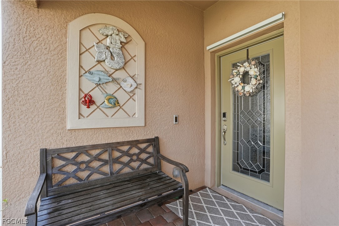 1936 Wellington Street Naples, FL 34120 - Photo 3 of 27 a view of a door and wooden floor