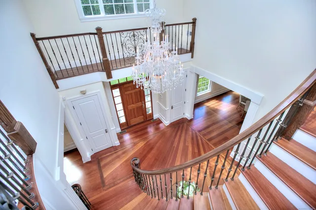 a view of entryway with wooden floor