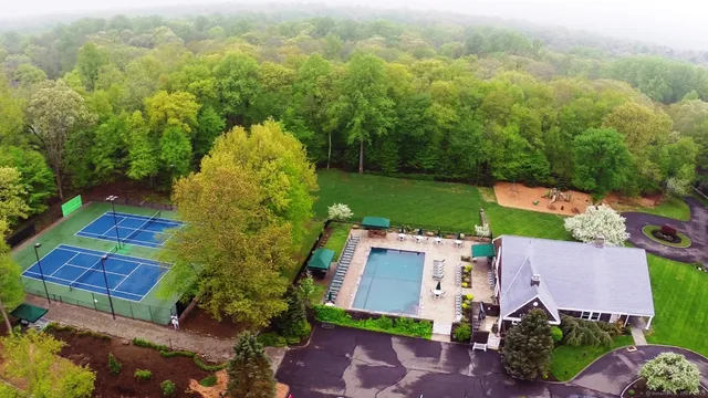 an aerial view of a house with a garden