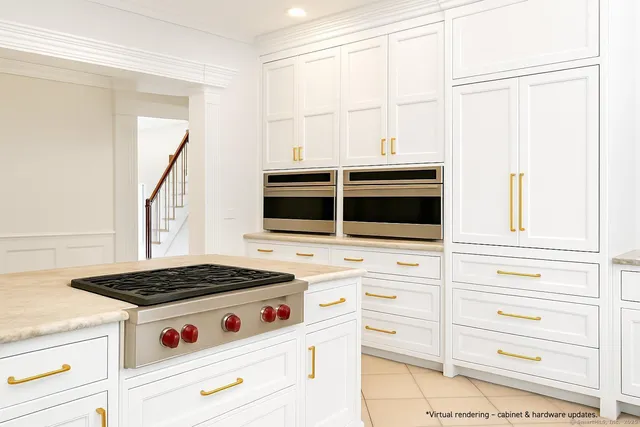 a kitchen with granite countertop a stove and a microwave