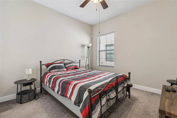 a view of an house with backyard space and balcony