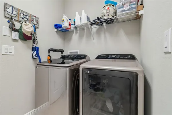 a aerial view of a house with a garden and plants