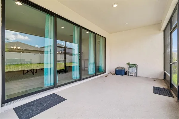 an aerial view of a building with outdoor space