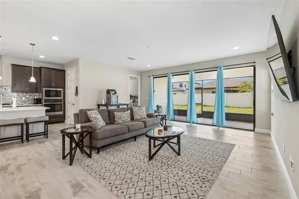 a kitchen with kitchen island granite countertop a sink and counter space
