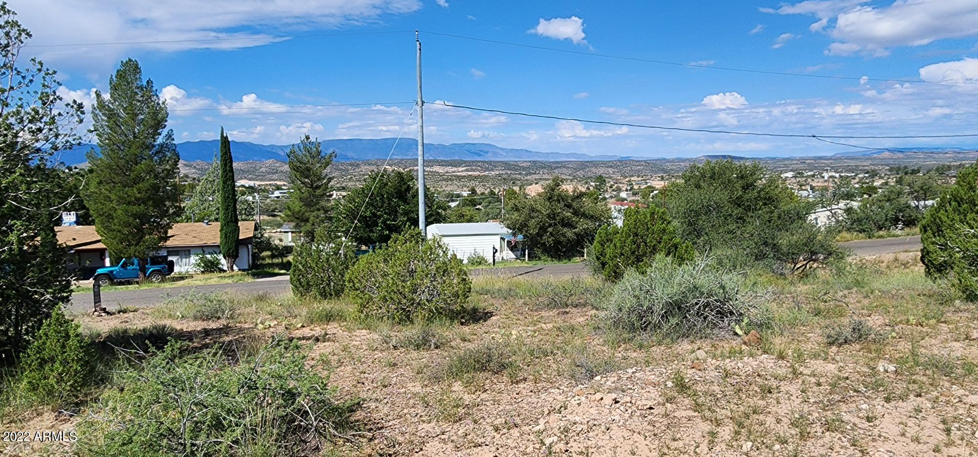 3570 Warrior Rest, Unit 132 Rimrock, AZ 86335 - Photo 1 of 31 a view of a yard with plants and a yard
