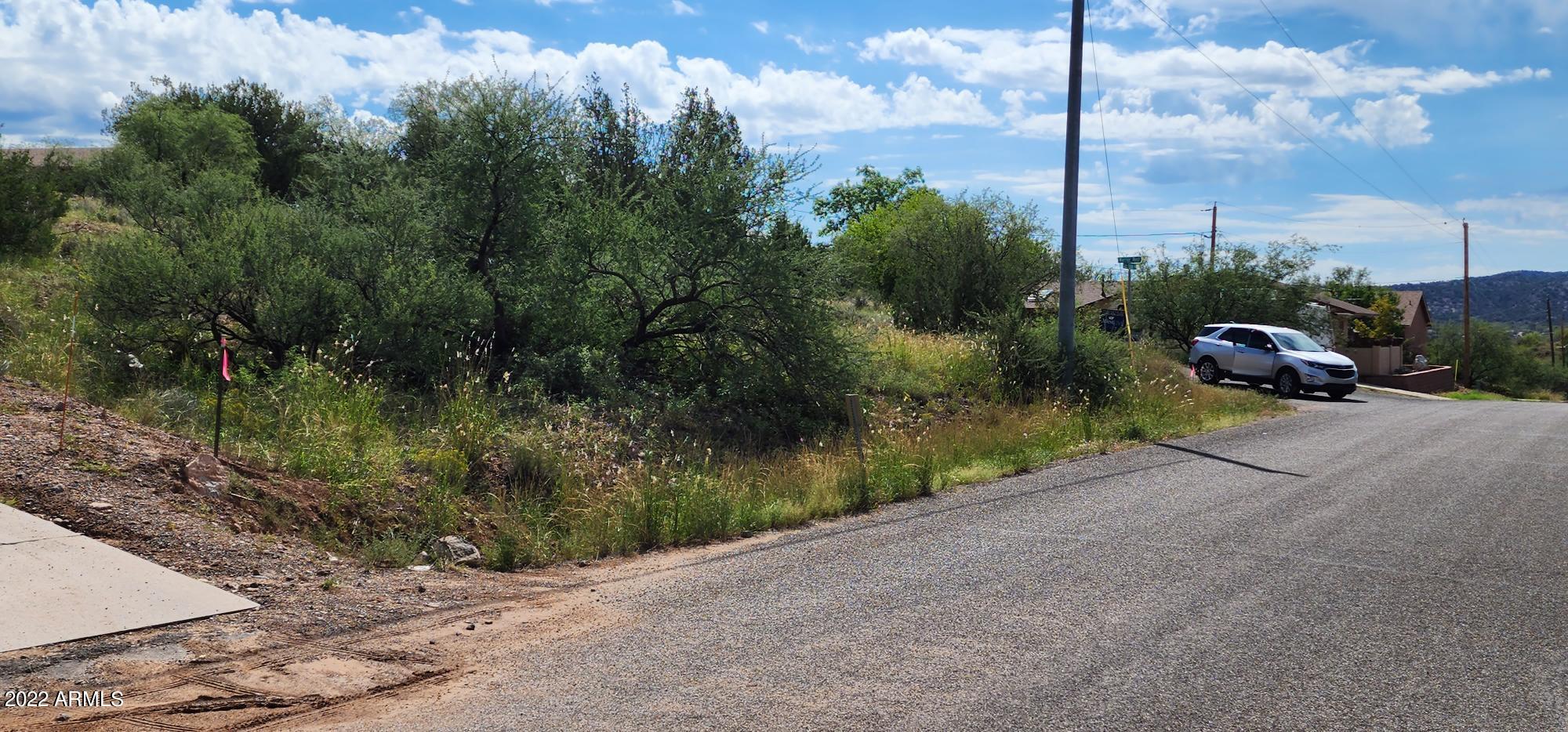 3570 Warrior Rest, Unit 132 Rimrock, AZ 86335 - Photo 5 of 31 a view of a road with a yard