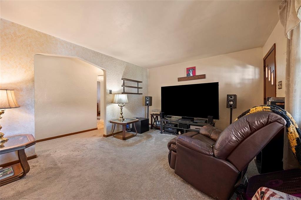 1421 Fleming Avenue McKees Rocks, PA 15136 - Photo 14 of 36 a living room with furniture and a flat screen tv
