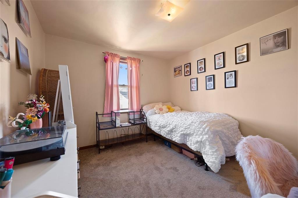 1421 Fleming Avenue McKees Rocks, PA 15136 - Photo 18 of 36 a bedroom with bed and a window