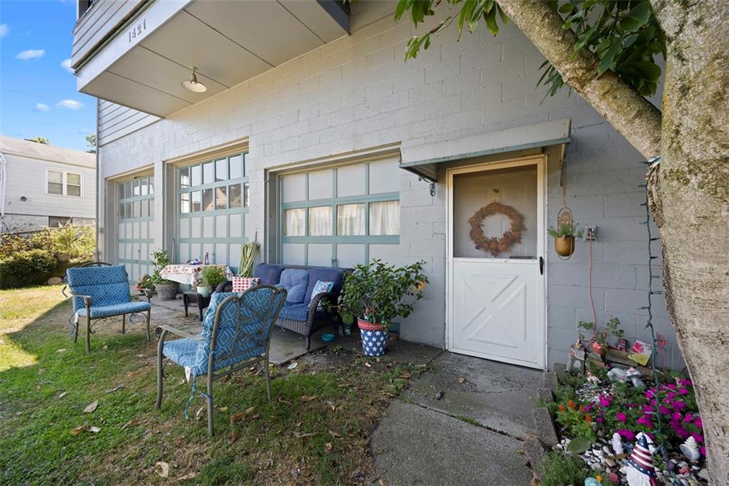 1421 Fleming Avenue McKees Rocks, PA 15136 - Photo 26 of 36 a living room filled with furniture and a potted plant