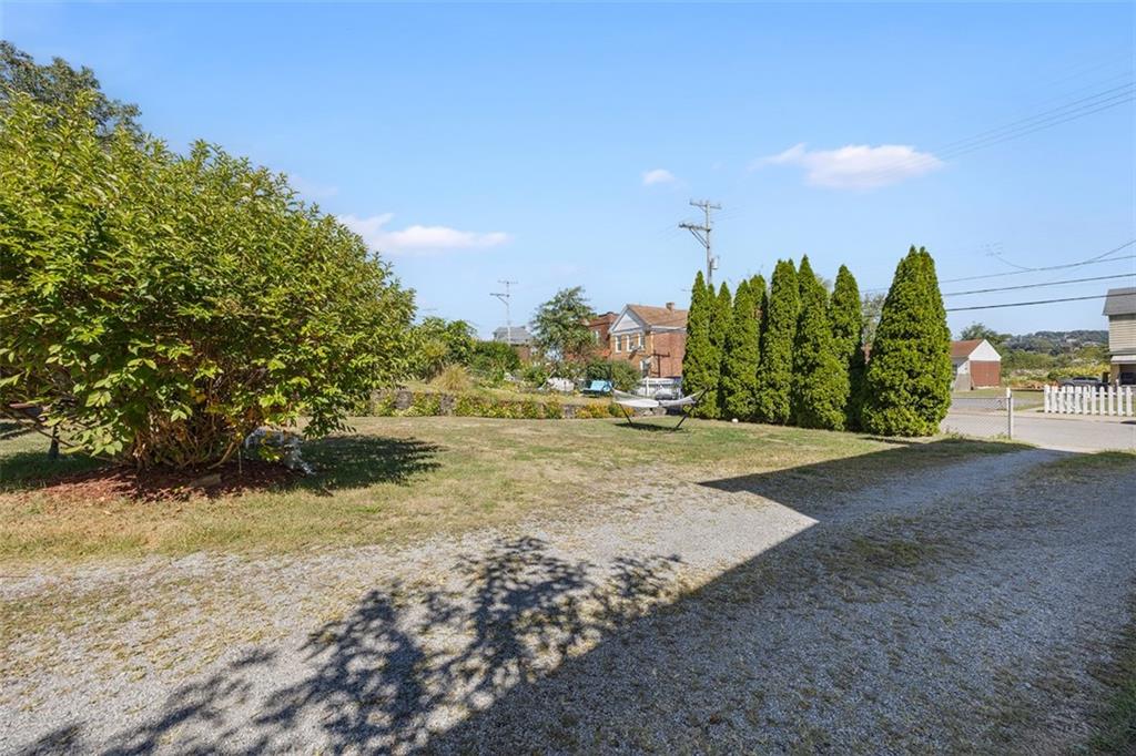 1421 Fleming Avenue McKees Rocks, PA 15136 - Photo 27 of 36 a view of a yard with a tree