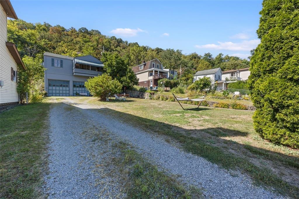 1421 Fleming Avenue McKees Rocks, PA 15136 - Photo 28 of 36 a view of a house with a yard