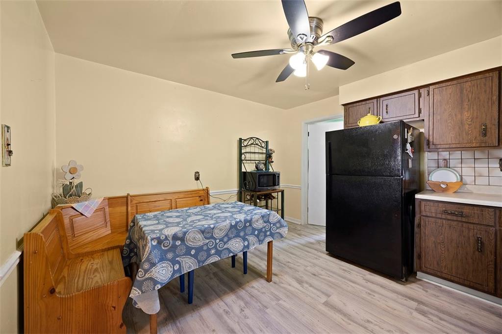 1421 Fleming Avenue McKees Rocks, PA 15136 - Photo 6 of 36 a kitchen with a refrigerator and a sink