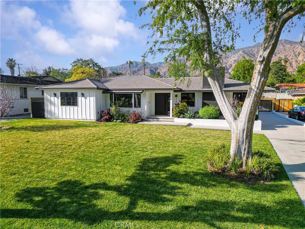 a view of a house with a garden