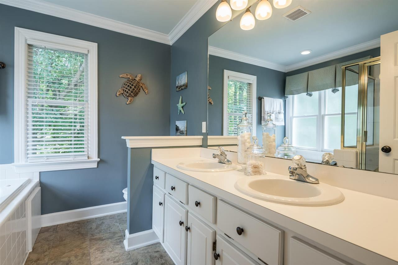 2612 Dahlgreen Road Raleigh, NC 27615 - Photo 14 of 25 Double sink, separate tub and shower, natural light. Access to open the window for fresh air. Beautiful, freshly painted crown molding. Blinds and curtains will stay. Master Bath/Spa