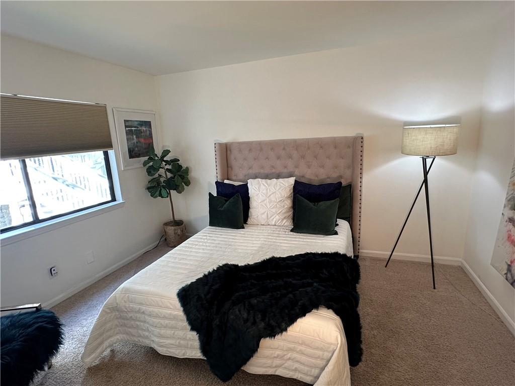 3823 Paces Ferry West Atlanta, GA 30339 - Photo 25 of 33 a bedroom with a bed and window