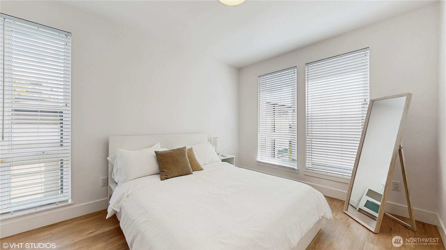 444 13th Avenue Seattle, WA 98122 - Photo 14 of 36 a bedroom with a bed and a window