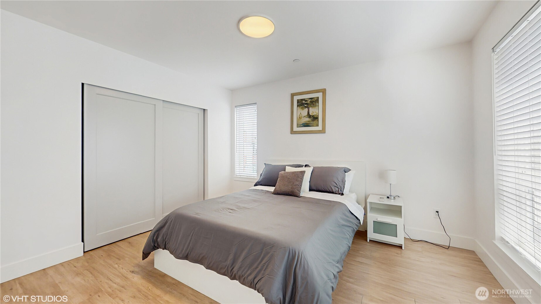 444 13th Avenue Seattle, WA 98122 - Photo 18 of 36 a bedroom with a bed and a window