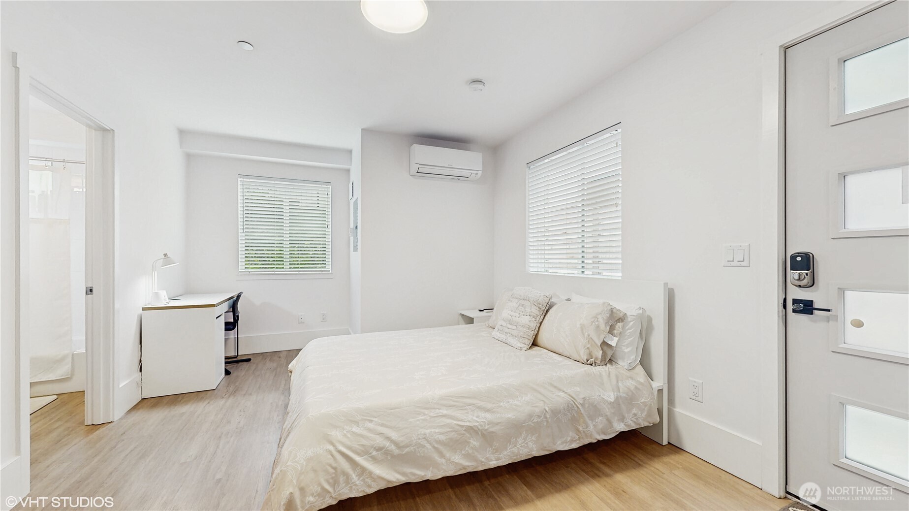 444 13th Avenue Seattle, WA 98122 - Photo 26 of 36 a bedroom with a bed and a window