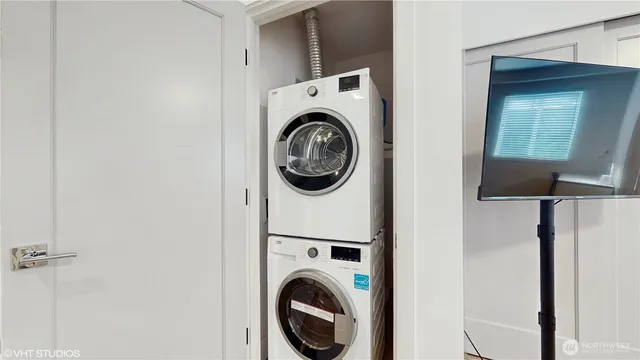 a utility room with dryer and washer